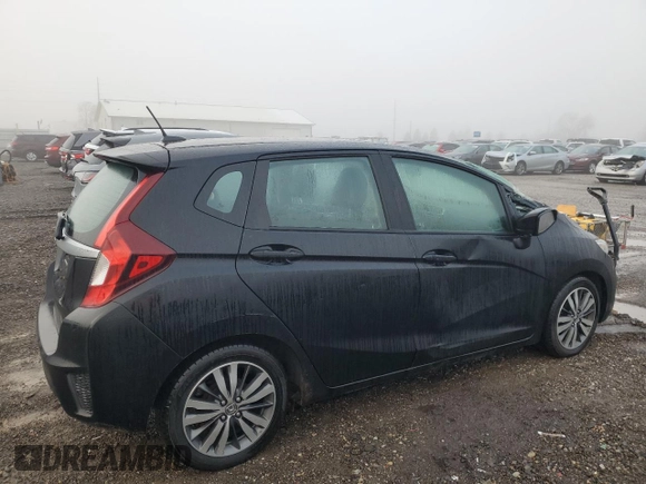 2015 Honda Fit EX-L with VIN 3HGGK5H82FM703509, listed as a Copart auction lot 86336004 with 155,193 mi miles and Salvage Title. Bid and sale history available at DreamBid. Image 3.