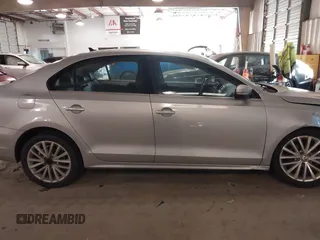 2012 Volkswagen Jetta Sedan SEL w/Sunroof with VIN 3VWLX7AJ4CM344390, listed as a IAAI auction lot 41439880 with 220,093 mi miles. Bid and sale history available at carsss.com. Image 13.