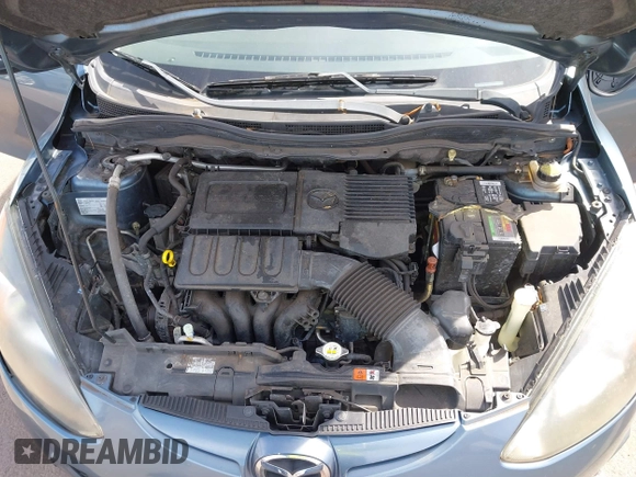2014 Mazda 2 Sport with VIN JM1DE1KY0E0181555, listed as a IAAI auction lot 41539841 with 121,918 mi miles and . Bid and sale history available at DreamBid. Image 10.