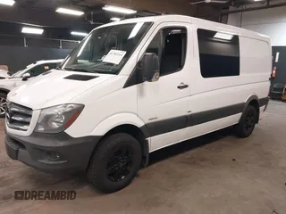 2014 Mercedes-Benz Sprinter Crew with VIN WD4PE7DC4E5865728, listed as a IAAI auction lot 41782214 with 125,193 mi miles. Bid and sale history available at carsss.com. Image 2.