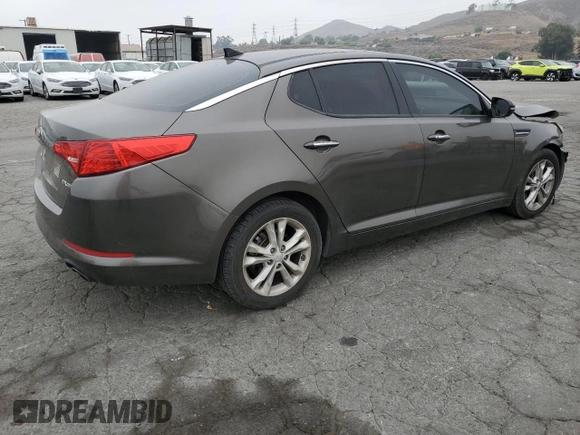 2013 Kia Optima EX with VIN 5XXGN4A78DG107255, listed as a Copart auction lot 61015475 with 168,006 mi miles and Salvage title. Bid and sale history available at DreamBid. Image 3.