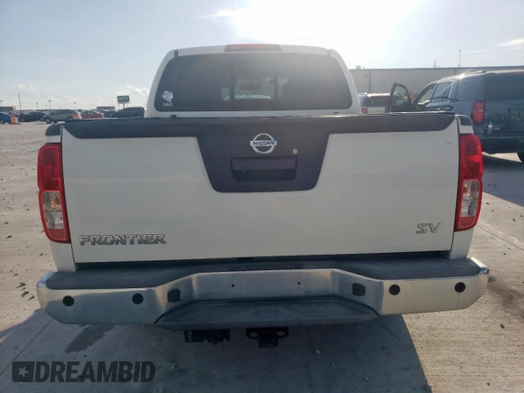 2015 Nissan Frontier SV with VIN 1N6AD0ER1FN711652, listed as a Copart auction lot 61087965 with 125,711 mi miles and Salvage title. Bid and sale history available at DreamBid. Image 6.