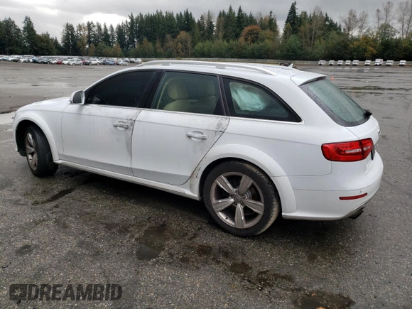 2014 Audi allroad Premium Plus with VIN WA1UFAFL8EA089139, listed as a Copart auction lot 76085834 with 70,960 mi miles and Salvage Title. Bid and sale history available at carsss.com. Image 2.