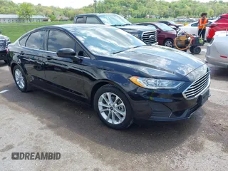 2020 Ford Fusion SE z VIN 3FA6P0HD8LR256216, wystawiony jako IAAI lot #42110395 z przebiegiem 57 823 mil mil oraz . Historia ofert i sprzedaży dostępna na DreamBid. Obrazek 1.