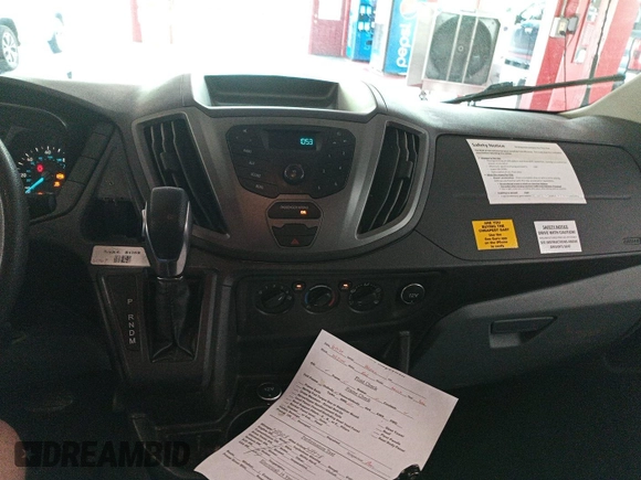 2016 Ford Transit Cargo z VIN 1FTYE1YM8GKB19172, wystawiony jako IAAI lot #42788511 z przebiegiem 143 978 mil mil oraz . Historia ofert i sprzedaży dostępna na DreamBid. Obrazek 9.