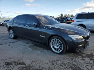 2014 BMW 7 Series ALPINA B7 xDrive with VIN WBAYF8C59ED652863, listed as a Copart auction lot 87630395 with Not Provided miles and Salvage Title. Bid and sale history available at DreamBid. Image 4.