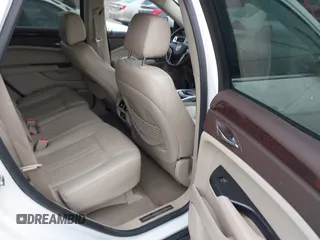 2016 Cadillac SRX Luxury Collection z VIN 3GYFNBE36GS519495, wystawiony jako IAAI lot #42147882 z przebiegiem 126 689 mil mil oraz . Historia ofert i sprzedaży dostępna na DreamBid. Obrazek 8.