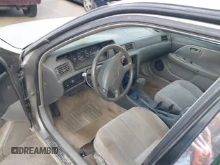 1998 Toyota Camry LE z VIN JT2BG22K8W0144508, wystawiony jako IAAI lot #42083963 z przebiegiem 222 776 mil mil oraz . Historia ofert i sprzedaży dostępna na DreamBid. Obrazek 5.