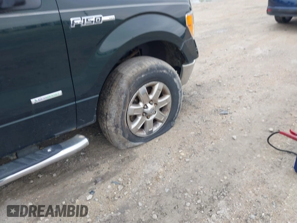 2013 Ford F-150 XL with VIN 1FTFW1ETXDFA33723, listed as a IAAI auction lot 39711808 with 112,922 mi miles. Bid and sale history available at carsss.com. Image 18.