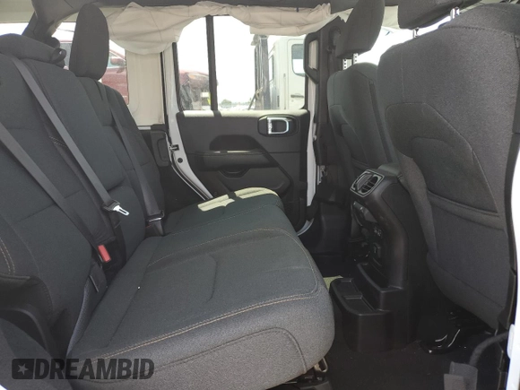 2024 Jeep Wrangler Sahara с VIN 1C4RJXP62RW275130, выставлен на аукционе Copart как лот 62665895 с пробегом 21 521 миль миль и На запчасти • Non repairable. История ставок и продаж доступна на DreamBid. Изображение 11.