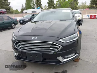 2017 Ford Fusion Titanium with VIN 3FA6P0SUXHR110304, listed as a IAAI auction lot 42119565 with 118,706 mi miles and . Bid and sale history available at DreamBid. Image 12.