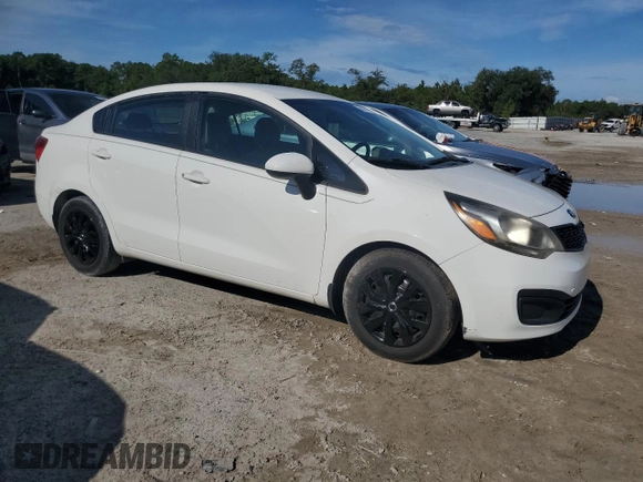2015 Kia Rio LX with VIN KNADM4A38F6436457, listed as a Copart auction lot 68740994 with 87,474 mi miles and Salvage Title. Bid and sale history available at carsss.com. Image 4.