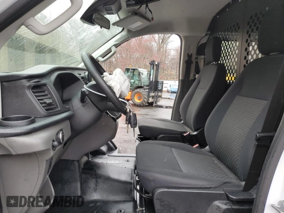 2024 Ford Transit Cargo with VIN 1FTBR1Y89RKA33854, listed as a Copart auction lot 50017425 with 10,491 mi miles and Clean Title. Bid and sale history available at DreamBid. Image 7.