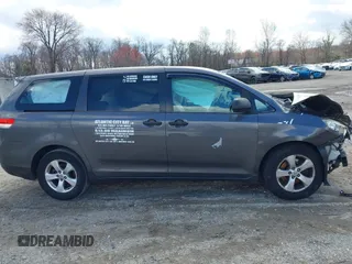 2014 Toyota Sienna L with VIN 5TDZK3DC4ES407928, listed as a IAAI auction lot 41887349 with 208,289 mi miles. Bid and sale history available at carsss.com. Image 13.
