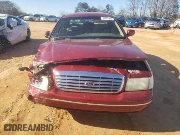 1998 Ford Crown Victoria LX с VIN 2FAFP74W3WX138757, выставлен на аукционе Copart как лот 87867945 с пробегом 148 827 миль миль и Списание • Salvage title. История ставок и продаж доступна на DreamBid. Изображение 5.