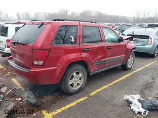 2006 Jeep Grand Cherokee Laredo with VIN 1J4HR48N66C251039, listed as a IAAI auction lot 40858197 with 178,094 mi miles. Bid and sale history available at carsss.com. Image 4.