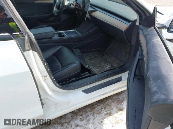 2022 Tesla Model 3 Long Range with VIN 5YJ3E1EB6NF114723, listed as a IAAI auction lot 41396258 with 2,179 mi miles and . Bid and sale history available at DreamBid. Image 5.