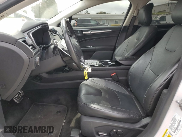2014 Ford Fusion Titanium with VIN 3FA6P0K97ER393249, listed as a Copart auction lot 53087355 with 148,266 mi miles and Salvage Title. Bid and sale history available at DreamBid. Image 7.
