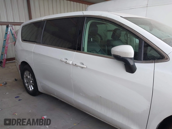 2023 Chrysler Pacifica Touring L with VIN 2C4RC1BG6PR550575, listed as a IAAI auction lot 42576498 with 54,373 mi miles and . Bid and sale history available at DreamBid. Image 13.