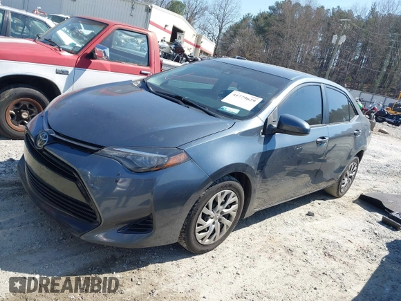 2019 Toyota Corolla L with VIN 2T1BURHE4KC134729, listed as a IAAI auction lot 41779629 with 240,685 mi miles. Bid and sale history available at carsss.com. Image 20.