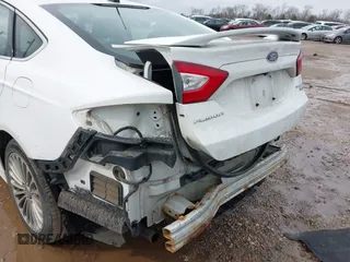 2016 Ford Fusion Titanium with VIN 3FA6P0K96GR158621, listed as a IAAI auction lot 41678349 with 182,162 mi miles. Bid and sale history available at carsss.com. Image 18.
