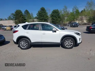 2015 Mazda CX-5 Sport with VIN JM3KE4BY3F0495511, listed as a IAAI auction lot 42170968 with 206,217 mi miles and . Bid and sale history available at carsss.com. Image 13.