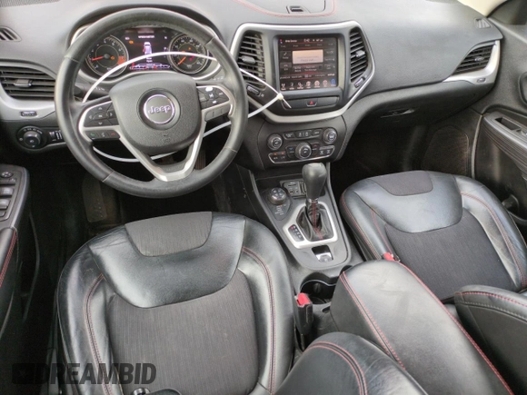 2015 Jeep Cherokee Trailhawk z VIN 1C4PJMBSXFW649425, wystawiony jako Copart lot #52900735 z przebiegiem 89 345 mil mil oraz Szkoda całkowita • Salvage title. Historia ofert i sprzedaży dostępna na DreamBid. Obrazek 8.