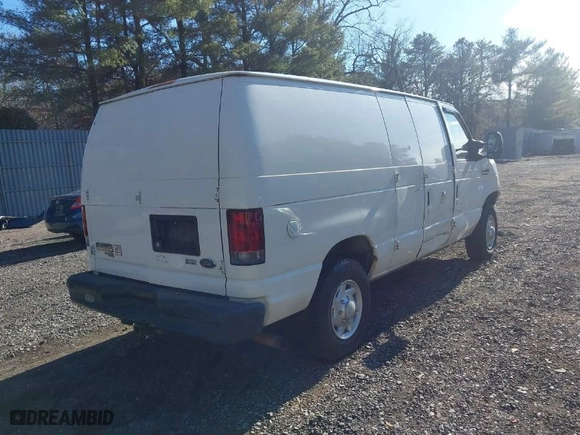 2012 Ford Econoline Cargo Van Commercial with VIN 1FTNE2EL7CDA53538, listed as a IAAI auction lot 41697483 with 142,154 mi miles. Bid and sale history available at carsss.com. Image 4.