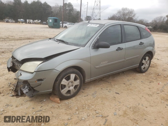2006 Ford Focus S with VIN 1FAHP37N76W180039, listed as a Copart auction lot 58328565 with 220,696 mi miles and Salvage title. Bid and sale history available at DreamBid. Image 1.