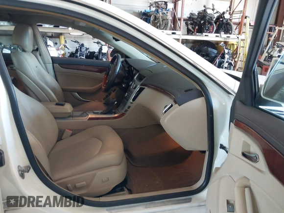 2010 Cadillac CTS Premium with VIN 1G6DS5EV8A0142811, listed as a IAAI auction lot 42562666 with 177,963 mi miles and . Bid and sale history available at DreamBid. Image 5.