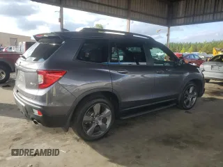 2021 Honda Passport Touring с VIN 5FNYF7H97MB012926, выставлен на аукционе Copart как лот 79346014 с пробегом 59 096 миль миль и Списание • Salvage title. История ставок и продаж доступна на DreamBid. Изображение 3.
