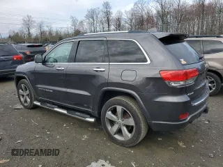 2015 Jeep Grand Cherokee Overland with VIN 1C4RJFCG0FC848046, listed as a Copart auction lot 49514795 with 212,688 mi miles and Clean title. Bid and sale history available at DreamBid. Image 2.