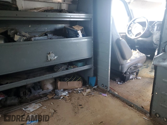 2012 Chevrolet Express Cargo с VIN 1GCSGAFX4C1117139, выставлен на аукционе Copart как лот 55267815 с пробегом 267 783 миль миль и Списание • Salvage title. История ставок и продаж доступна на DreamBid. Изображение 11.