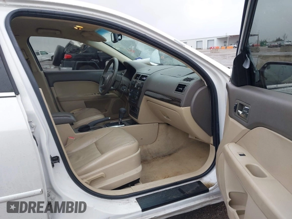 2009 Mercury Milan Premier z VIN 3MEHM08159R604286, wystawiony jako IAAI lot #41614675 z przebiegiem 129 172 mil mil oraz . Historia ofert i sprzedaży dostępna na DreamBid. Obrazek 5.