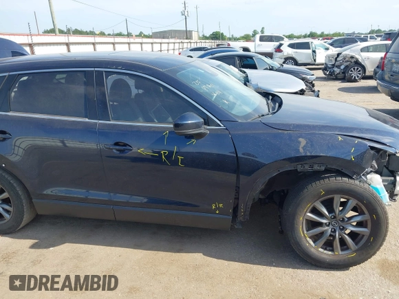 2020 Mazda CX-9 Touring with VIN JM3TCACY1L0419630, listed as a IAAI auction lot 42282675 with 105,207 mi miles and . Bid and sale history available at DreamBid. Image 14.