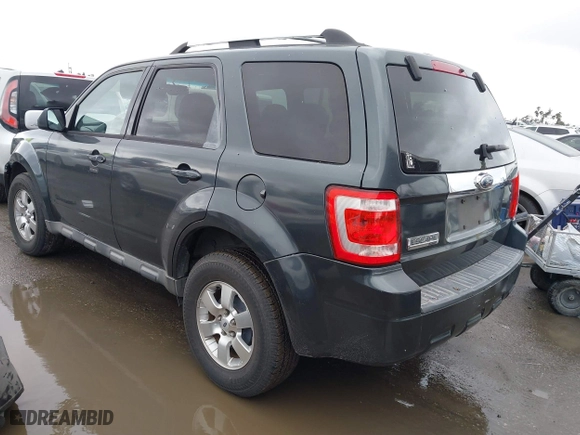 2009 Ford Escape Limited with VIN 1FMCU04759KB64236, listed as a IAAI auction lot 41796461 with 214,949 mi miles. Bid and sale history available at carsss.com. Image 3.