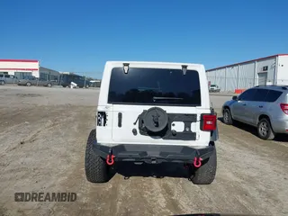2022 Jeep Wrangler Unlimited Rubicon z VIN 1C4JJXFGXNW121489, wystawiony jako IAAI lot #41749550 z przebiegiem 56 601 mil mil oraz . Historia ofert i sprzedaży dostępna na DreamBid. Obrazek 17.