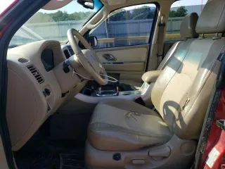 2006 Mercury Mariner Hybrid z VIN 4M2CU98H16KJ16041, wystawiony jako Copart lot #62182264 z przebiegiem 242 209 mil mil oraz Szkoda całkowita • Salvage title. Historia ofert i sprzedaży dostępna na DreamBid. Obrazek 7.