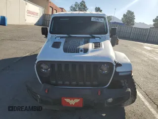 2023 Jeep Wrangler Rubicon Farout с VIN 1C4JJXFM2PW588219, выставлен на аукционе Copart как лот 77599774 с пробегом 38 914 миль миль и Списание • Salvage title. История ставок и продаж доступна на DreamBid. Изображение 5.