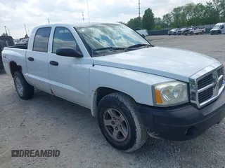 2006 Dodge Dakota SLT with VIN 1D7HW48K96S504192, listed as a IAAI auction lot 42282143 with 140,000 mi miles and . Bid and sale history available at DreamBid. Image 1.