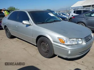 2001 Toyota Camry CE with VIN 4T1BG22K11U111984, listed as a IAAI auction lot 42009171 with 160,082 mi miles. Bid and sale history available at carsss.com. Image 1.