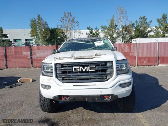 2016 GMC Sierra 1500 SLT with VIN 3GTU2NEC2GG244329, listed as a IAAI auction lot 40810002 with 121,716 mi miles. Bid and sale history available at carsss.com. Image 12.