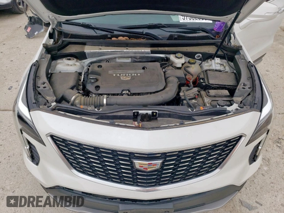 2023 Cadillac XT4 FWD Premium Luxury with VIN 1GYFZCR42PF110122, listed as a Copart auction lot 57332955 with 11,427 mi miles and Salvage title. Bid and sale history available at DreamBid. Image 11.