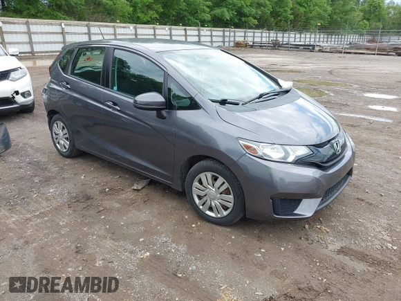 2015 Honda Fit LX z VIN 3HGGK5H59FM714352, wystawiony jako IAAI lot #42156097 z przebiegiem 103 587 mil mil oraz . Historia ofert i sprzedaży dostępna na DreamBid. Obrazek 1.