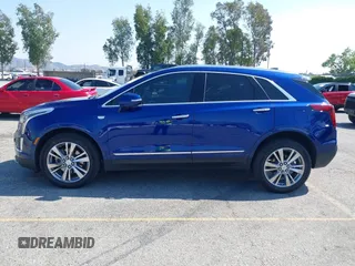2023 Cadillac XT5 FWD Premium Luxury z VIN 1GYKNCRS3PZ176654, wystawiony jako IAAI lot #42136259 z przebiegiem 20 403 mil mil oraz . Historia ofert i sprzedaży dostępna na DreamBid. Obrazek 15.