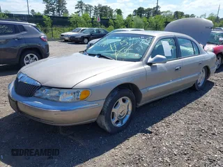 2001 Lincoln Continental z VIN 1LNHM97V31Y638576, wystawiony jako IAAI lot #42305531 z przebiegiem Nie podano mil oraz . Historia ofert i sprzedaży dostępna na DreamBid. Obrazek 2.