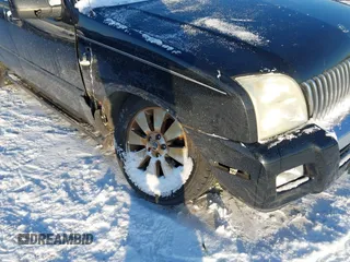2006 Mercury Mountaineer Luxury with VIN 4M2EU47E56UJ21590, listed as a IAAI auction lot 41328194 with 216,508 mi miles. Bid and sale history available at carsss.com. Image 6.