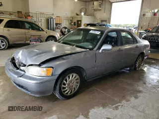 1998 Acura RL Premium with VIN JH4KA965XWC012742, listed as a Copart auction lot 73298574 with 0 mi miles and Salvage Title. Bid and sale history available at carsss.com. Image 1.