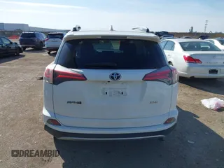 2018 Toyota RAV4 XLE with VIN JTMWFREV7JJ728184, listed as a IAAI auction lot 41377413 with 117,957 mi miles. Bid and sale history available at carsss.com. Image 15.