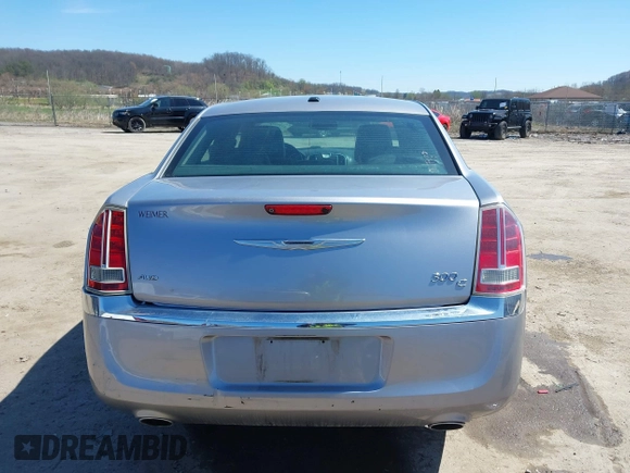 2014 Chrysler 300 C with VIN 2C3CCAKG6EH379114, listed as a IAAI auction lot 41992957 with 151,949 mi miles and . Bid and sale history available at carsss.com. Image 17.